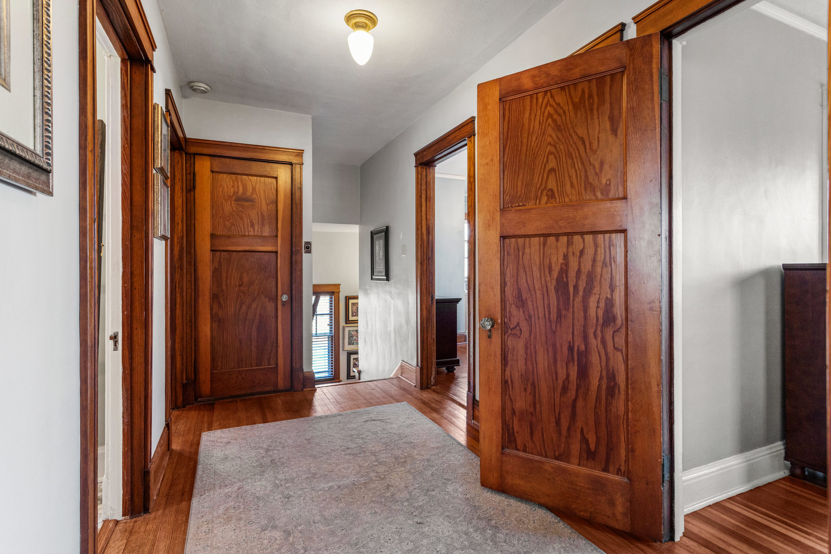 1124 North State Street Monticello, IL 61856 - Photo 27 of 53 a view of a hallway with wooden floor and cabinets