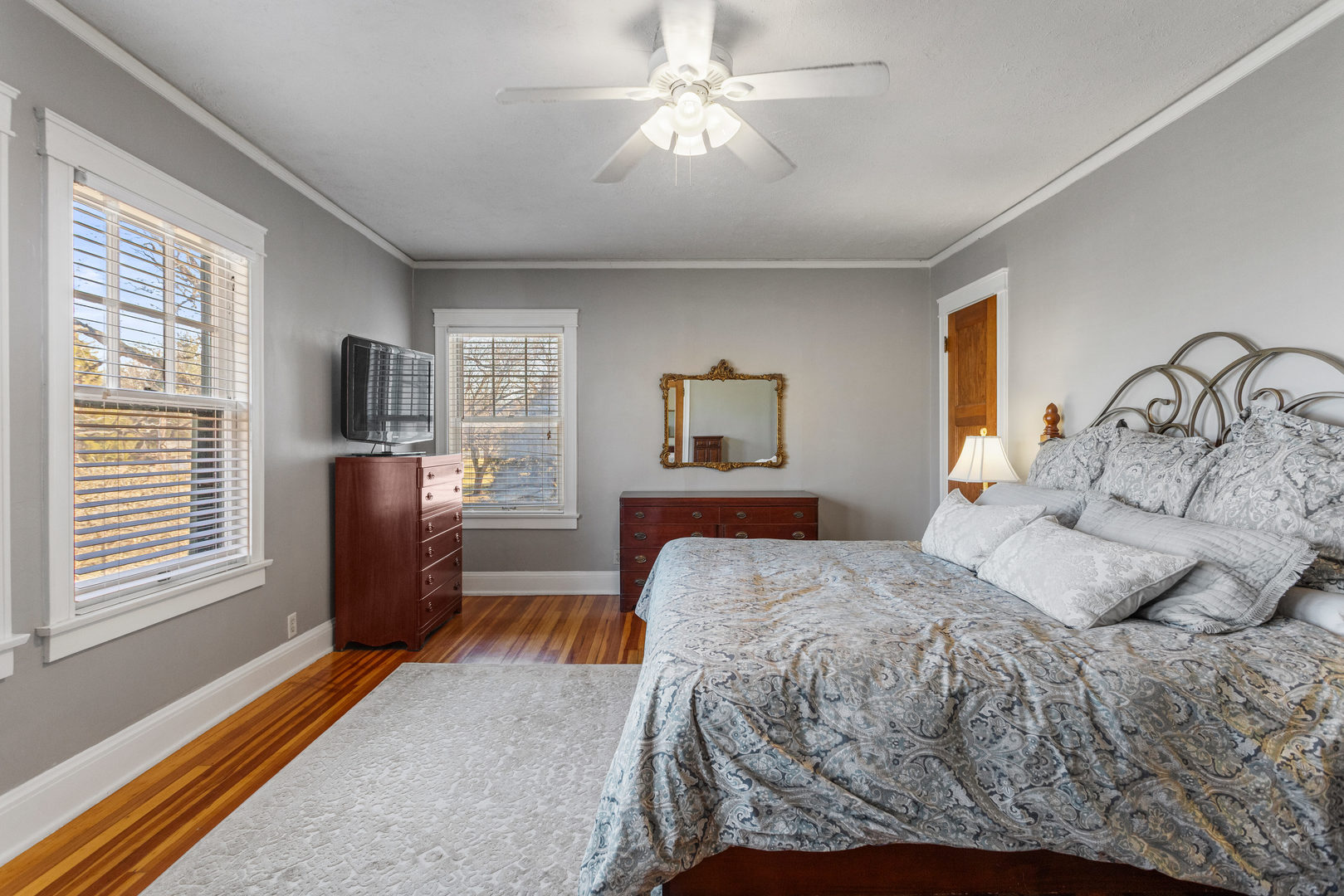 1124 North State Street Monticello, IL 61856 - Photo 29 of 53 a bedroom with a bed dresser and a window