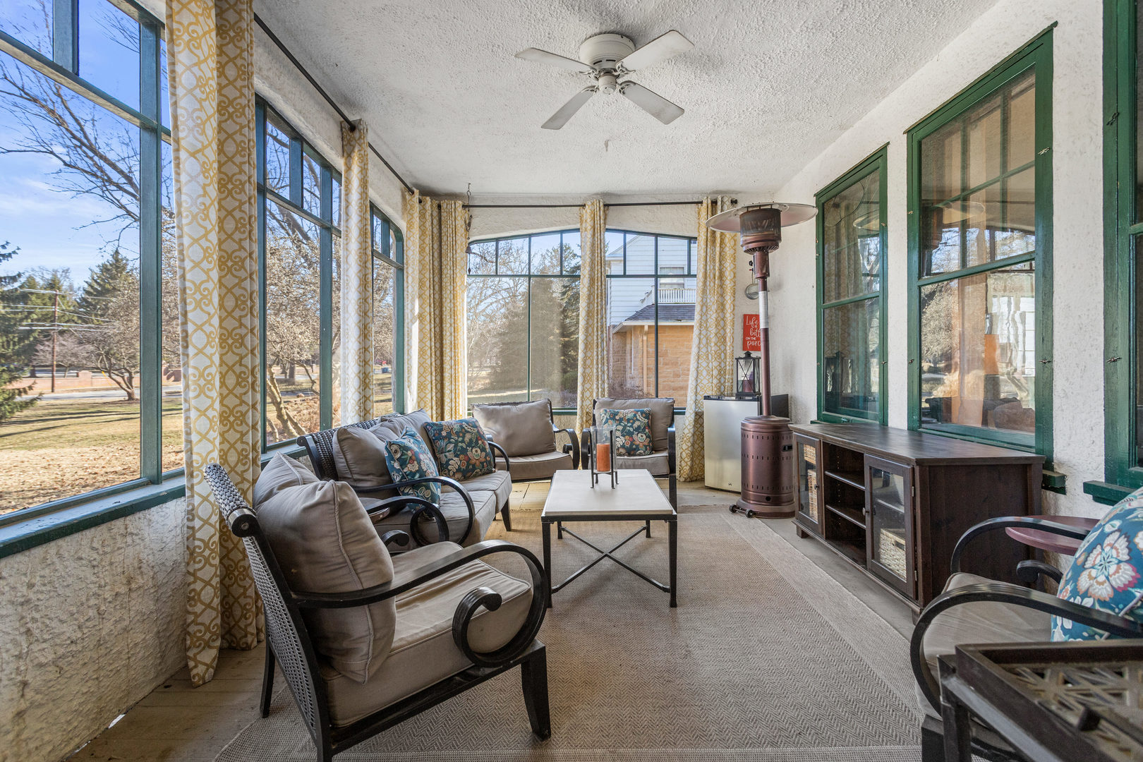 1124 North State Street Monticello, IL 61856 - Photo 4 of 53 a living room with furniture and floor to ceiling windows