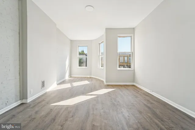 an empty room with windows