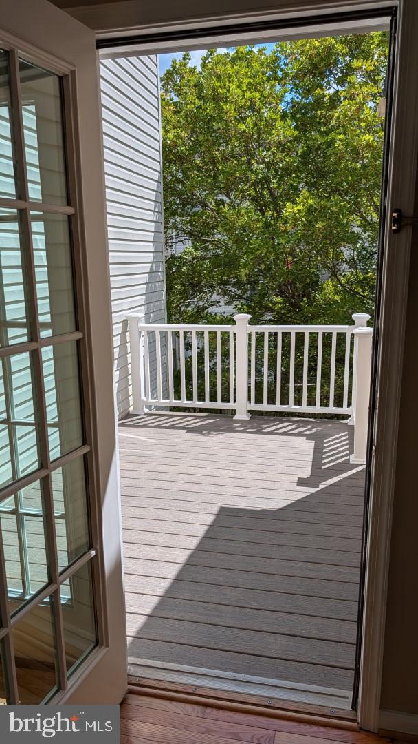 19919 Ridgecrest Square Ashburn, VA 20147 - Photo 11 of 22 a view of balcony with wooden floor