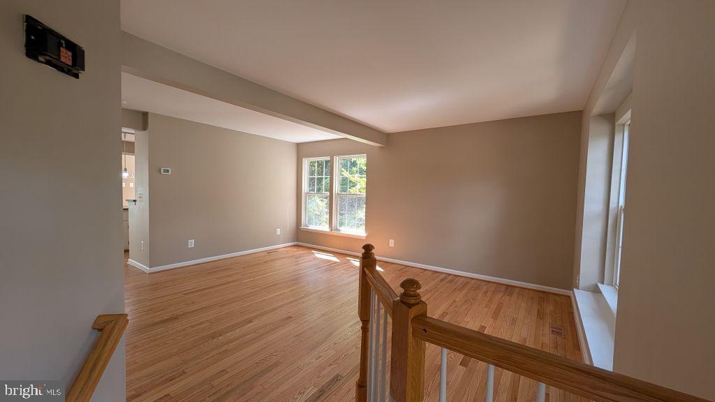 19919 Ridgecrest Square Ashburn, VA 20147 - Photo 3 of 22 a view of an empty room with a window