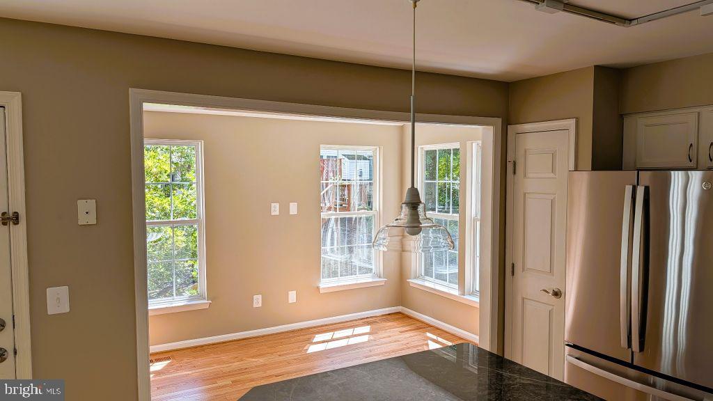 19919 Ridgecrest Square Ashburn, VA 20147 - Photo 9 of 22 a view of an empty room with a window