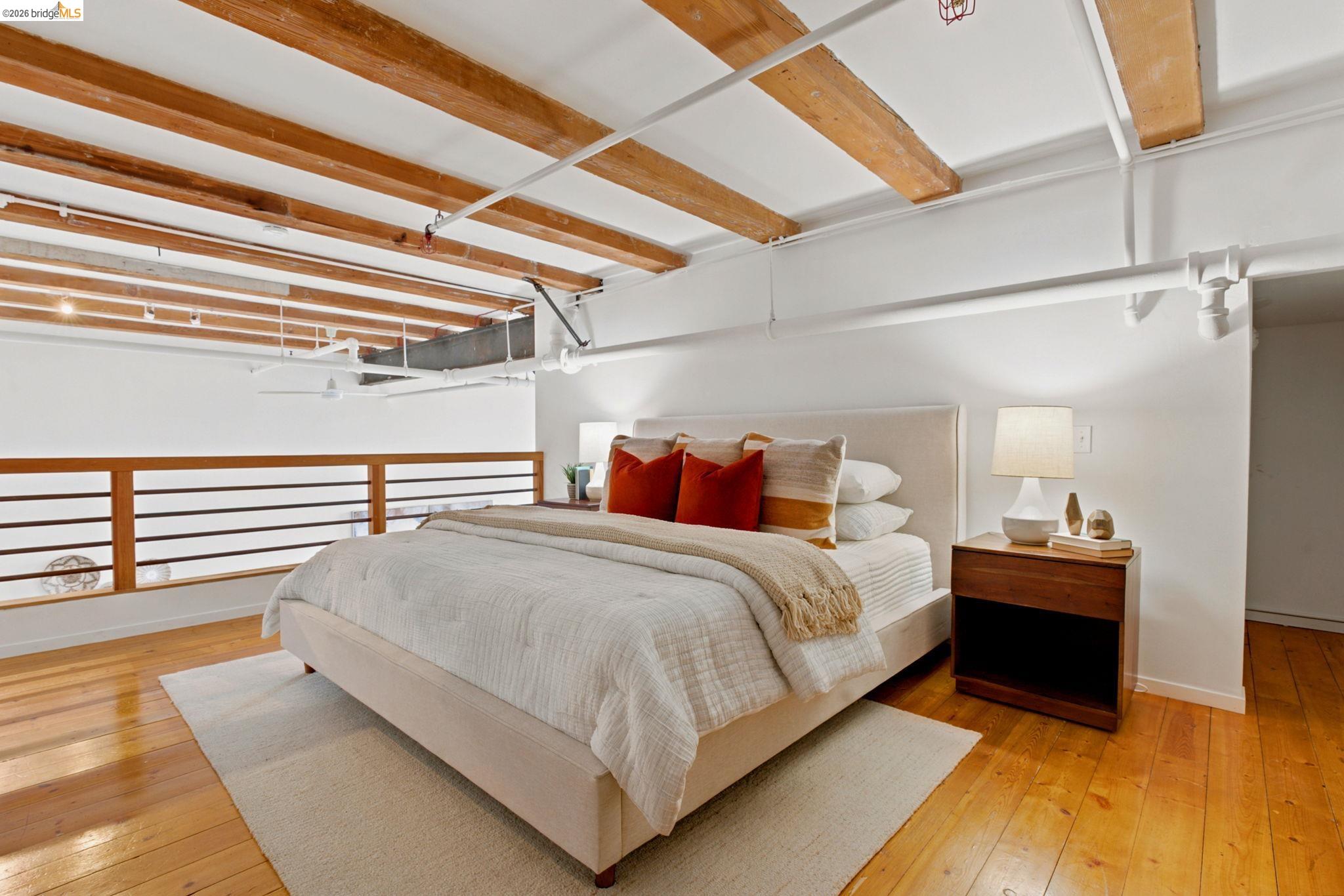 1920 Union Street, Unit 9 Oakland, CA 94607 - Photo 23 of 35 Bedroom with exposed ceiling beams and ductwork