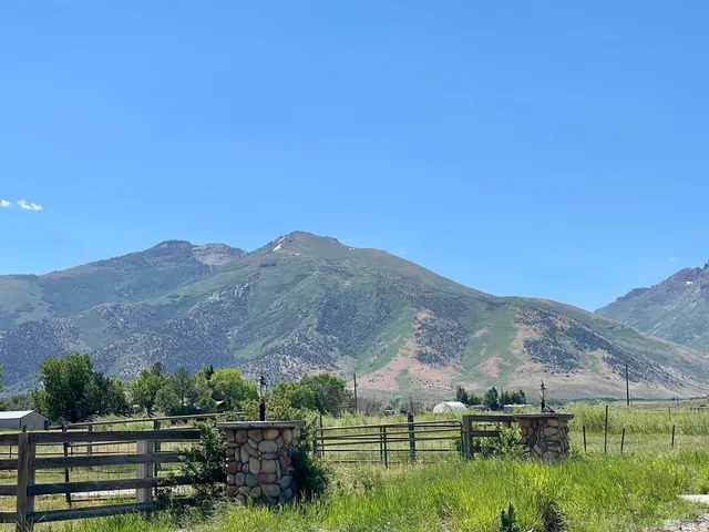 a view of house with mountain view