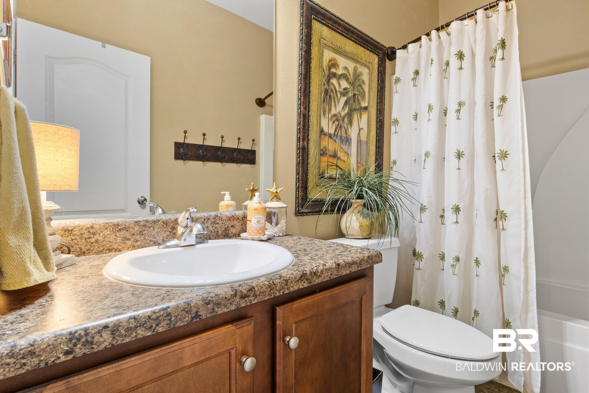 1752 Abbey Loop Foley, AL 36535 - Photo 15 of 21 Full bathroom with vanity, shower / bath combination with curtain, and toilet