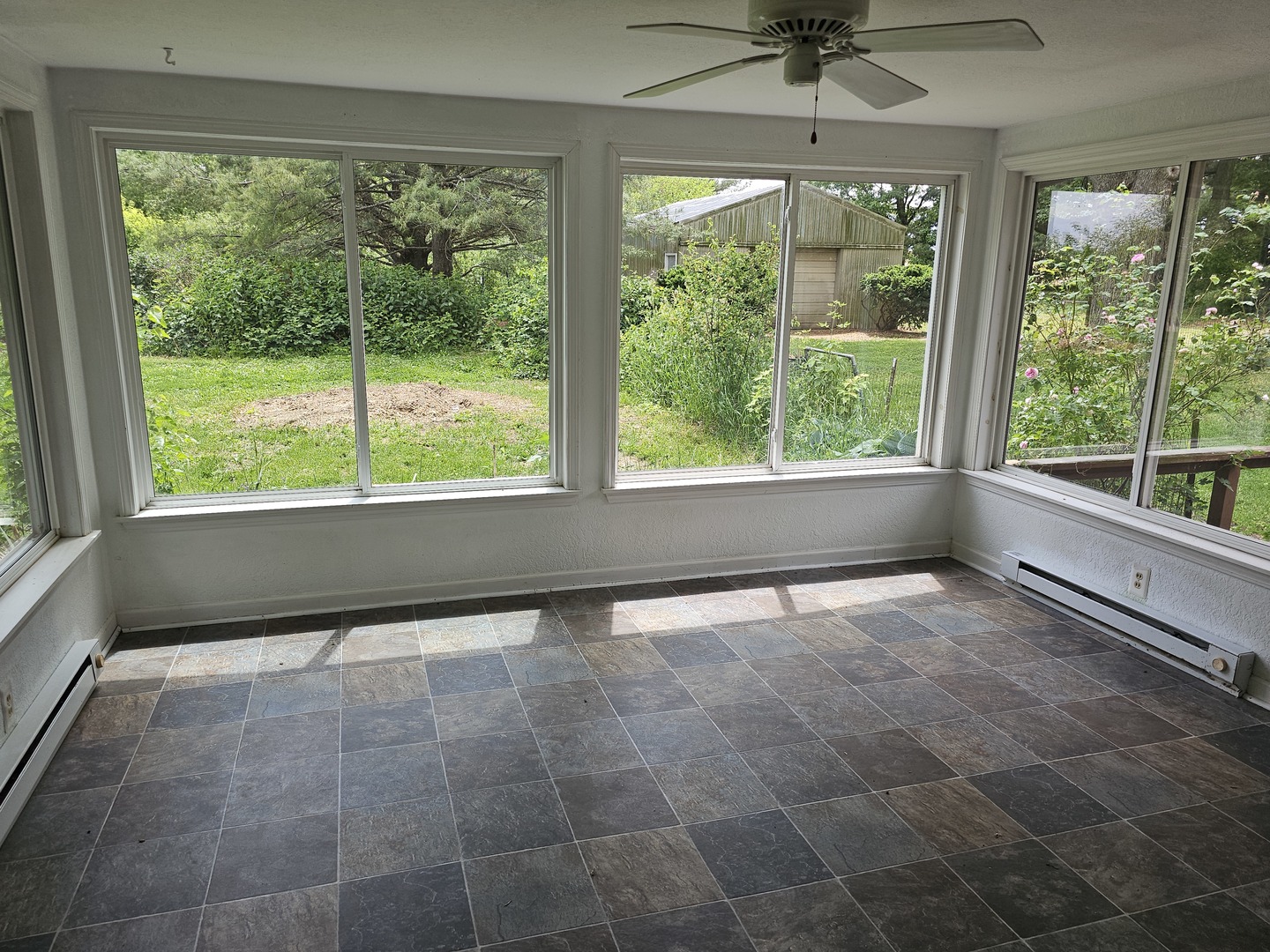 23025 Hazel Road Sterling, IL 61081 - Photo 6 of 29 a view of an empty room with a window