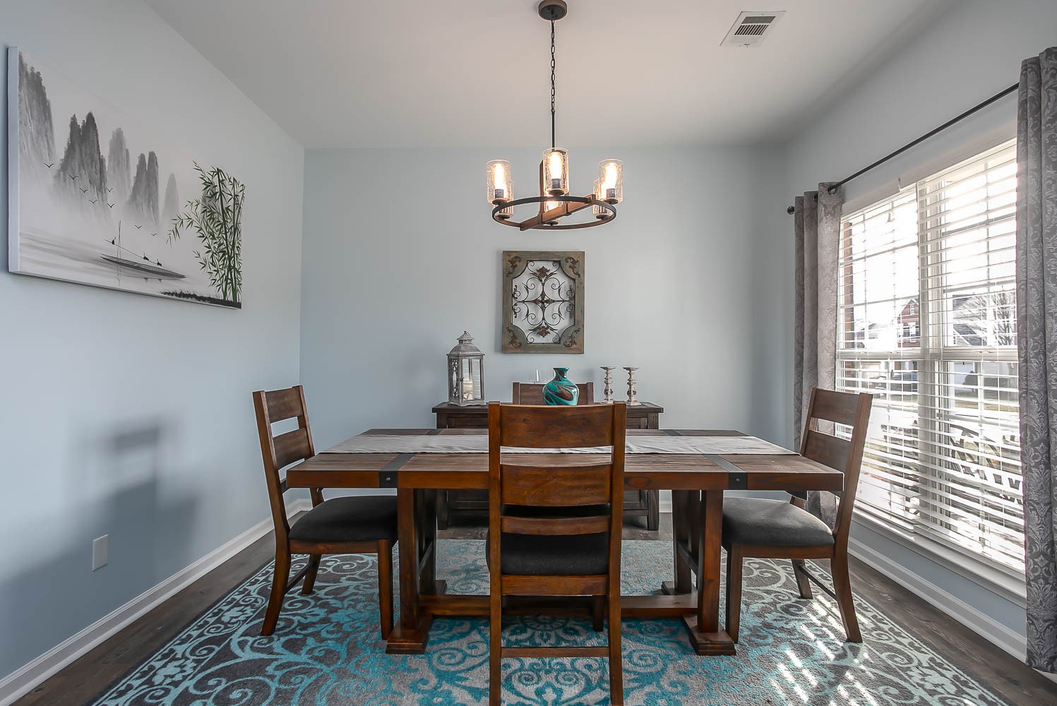 1715 Emma Circle Spring Hill, TN 37174 - Photo 2 of 17 a view of a dining room with furniture window and wooden floor