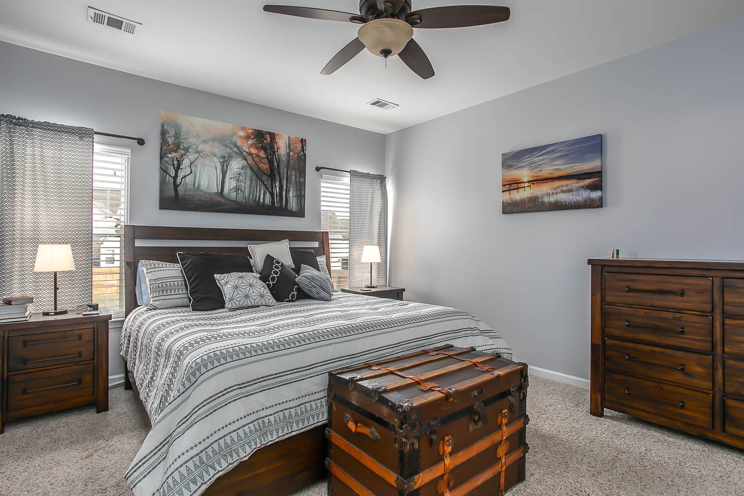 1715 Emma Circle Spring Hill, TN 37174 - Photo 7 of 17 a bedroom with a bed and a chandelier