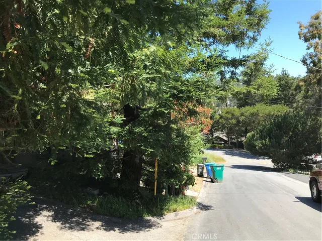 a view of city street with trees