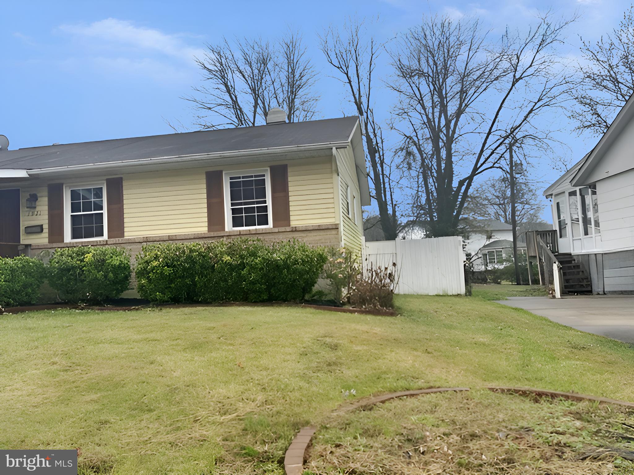 1921 Harewood Road Edgewood, MD 21040 - Photo 6 of 25 a front view of a house with garden