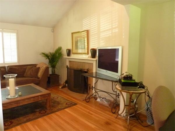 170 Middlesex Road Chestnut Hill, MA 02467 - Photo 3 of 7 a living room with furniture and a flat screen tv