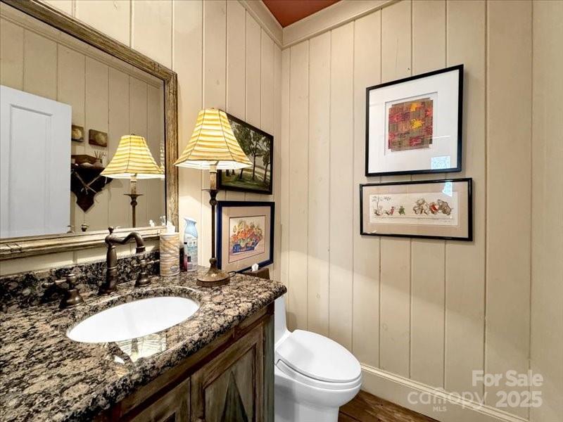116 Dana Road Waynesville, NC 28786 - Photo 14 of 42 a bathroom with a granite countertop sink and a mirror