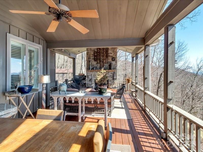 116 Dana Road Waynesville, NC 28786 - Photo 22 of 42 a view of a dining room with furniture window and outside view