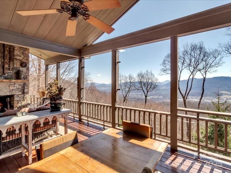 116 Dana Road Waynesville, NC 28786 - Photo 23 of 42 a view of a living room and balcony