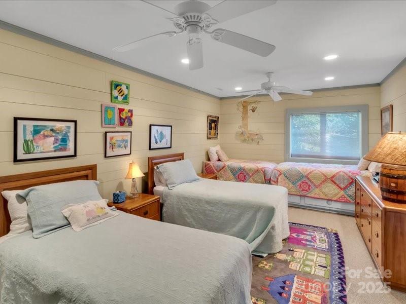 116 Dana Road Waynesville, NC 28786 - Photo 26 of 42 a bedroom with a bed and furniture