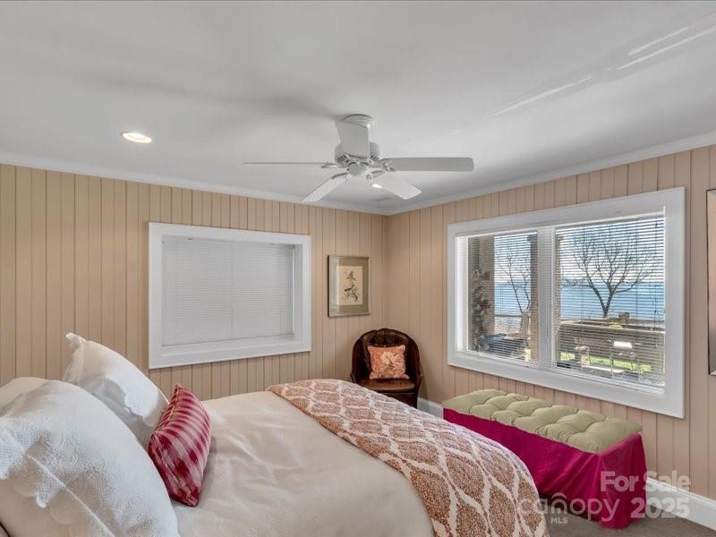 116 Dana Road Waynesville, NC 28786 - Photo 33 of 42 a bedroom with a large bed and a window