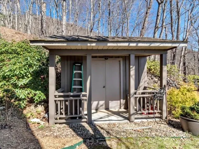 a view of a dinning room with balcony and furniture