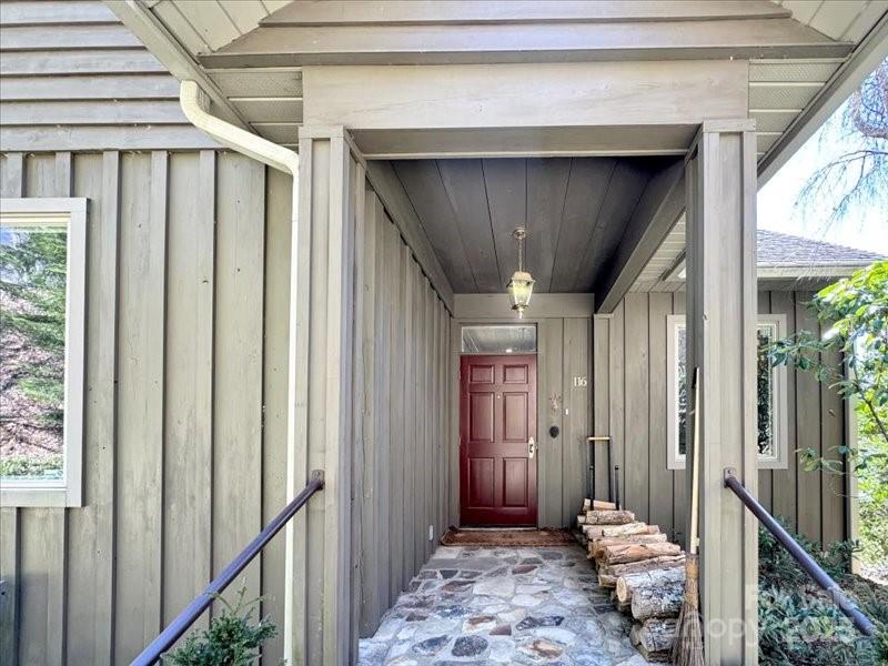 116 Dana Road Waynesville, NC 28786 - Photo 42 of 42 a view of a hallway with wooden floor and entryway