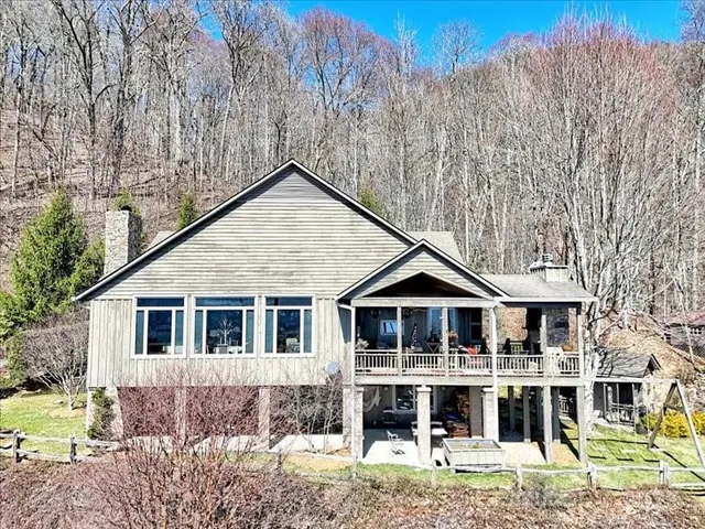 a front view of a house with glass windows