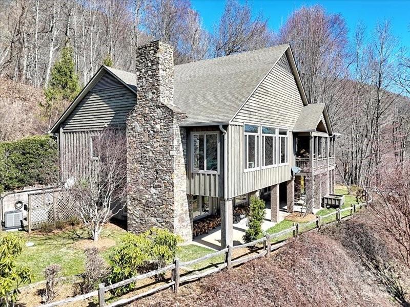 116 Dana Road Waynesville, NC 28786 - Photo 8 of 42 a front view of a house with a yard