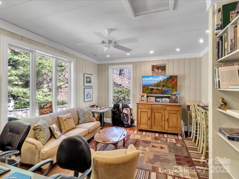 116 Dana Road Waynesville, NC 28786 - Photo 9 of 42 a living room with furniture and a flat screen tv