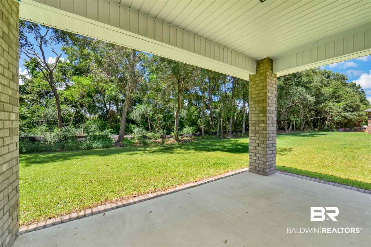 9348 Impala Drive, Unit 21 Foley, AL 36535 - Photo 21 of 22 Back covered porch