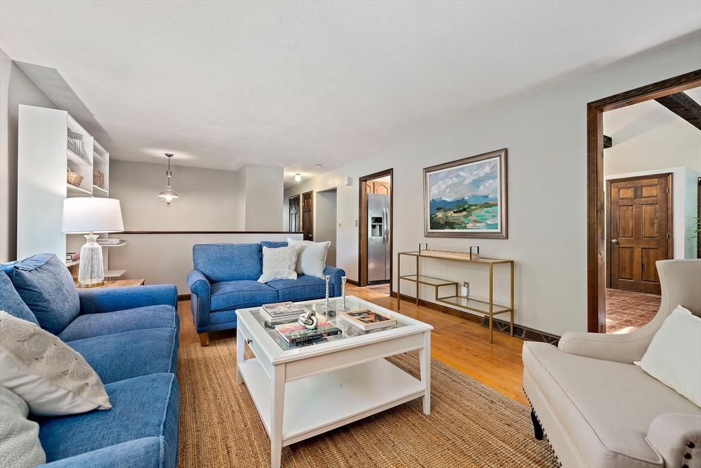 7 Josephine Street Canton, MA 02021 - Photo 13 of 30 a living room with furniture white walls and wooden floor