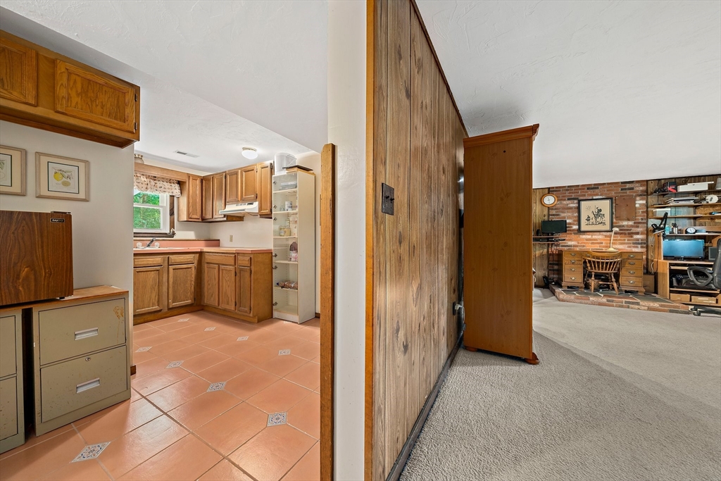7 Josephine Street Canton, MA 02021 - Photo 22 of 30 a view of a kitchen with furniture and a window