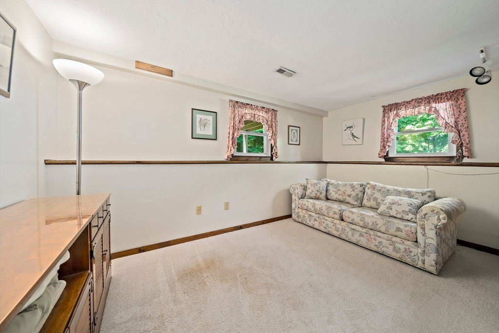 7 Josephine Street Canton, MA 02021 - Photo 26 of 30 a living room with furniture and a window