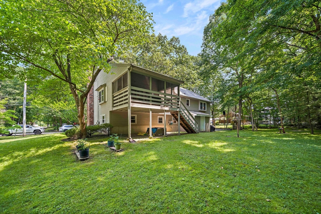 7 Josephine Street Canton, MA 02021 - Photo 27 of 30 a front view of a house with a yard
