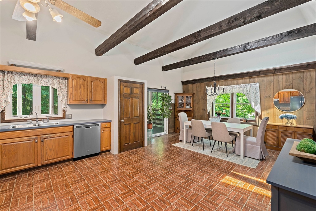 7 Josephine Street Canton, MA 02021 - Photo 6 of 30 a living room with granite countertop furniture and a kitchen view