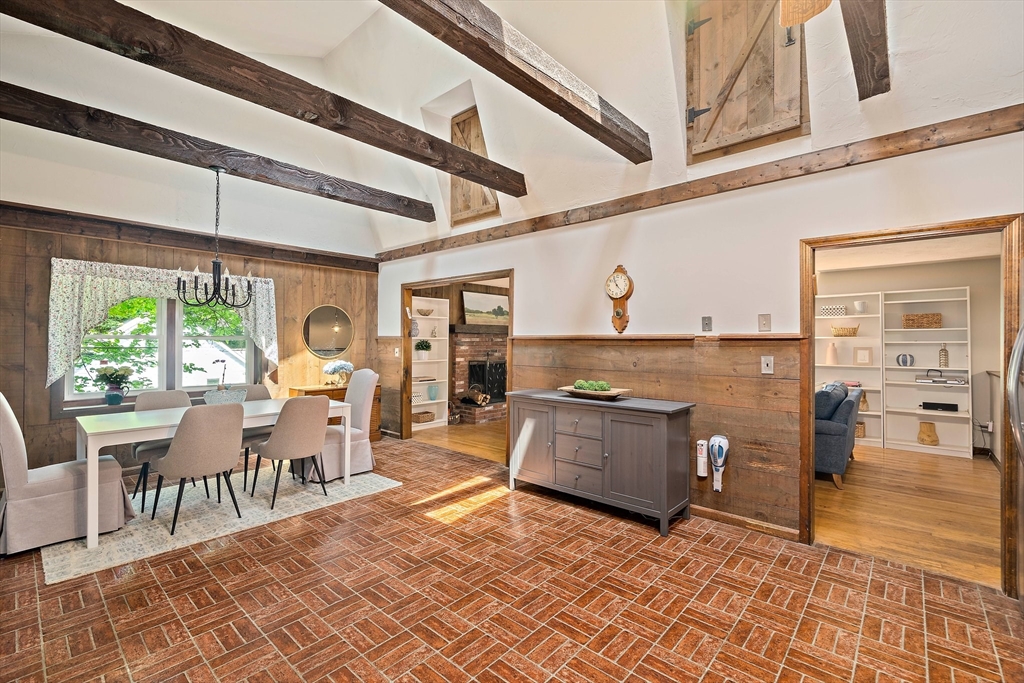 7 Josephine Street Canton, MA 02021 - Photo 7 of 30 a living room with stainless steel appliances furniture a rug and a large window