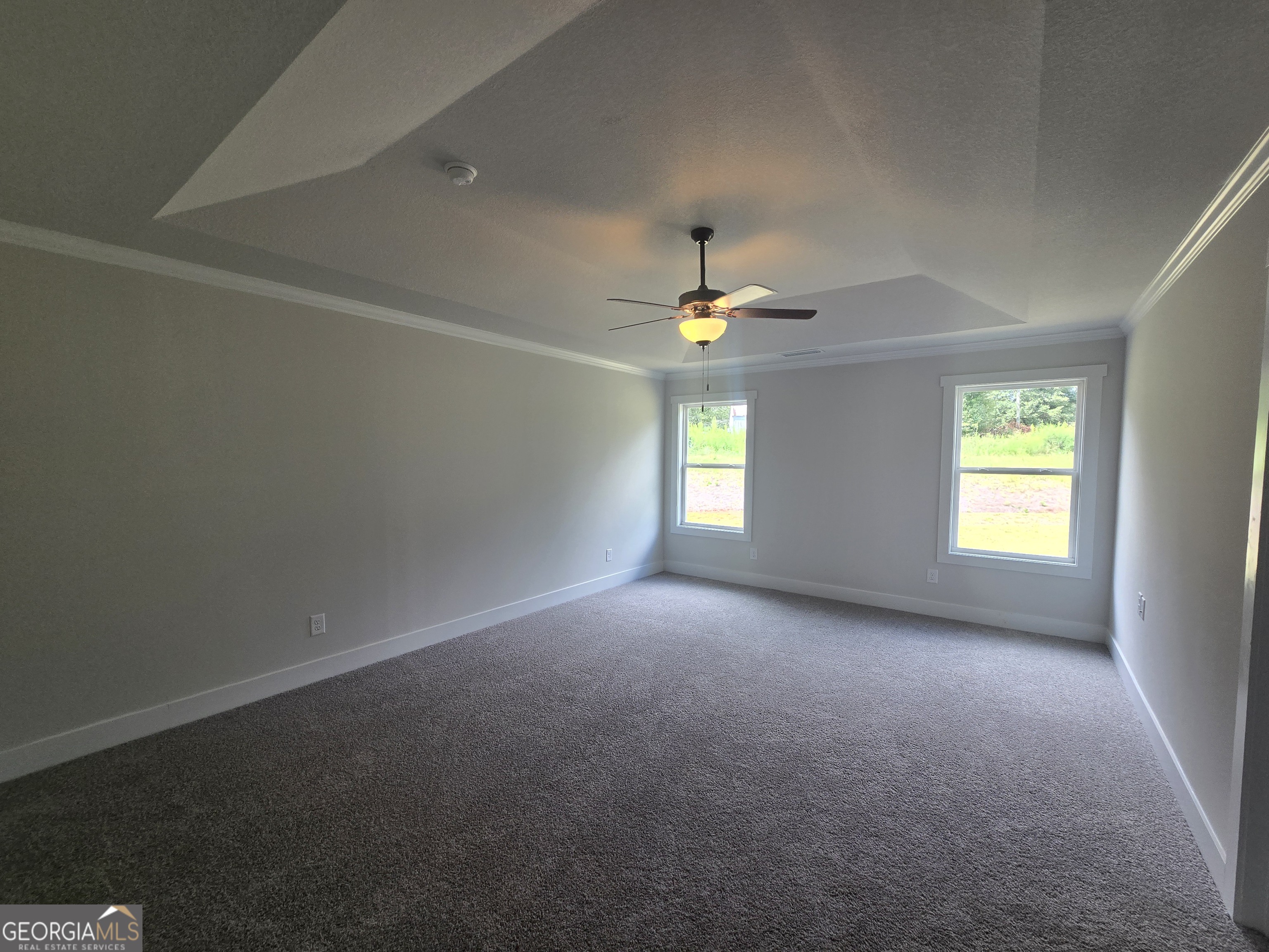 51 Champions Lane, Unit 2 Winder, GA 30680 - Photo 10 of 16 a view of an empty room with a window