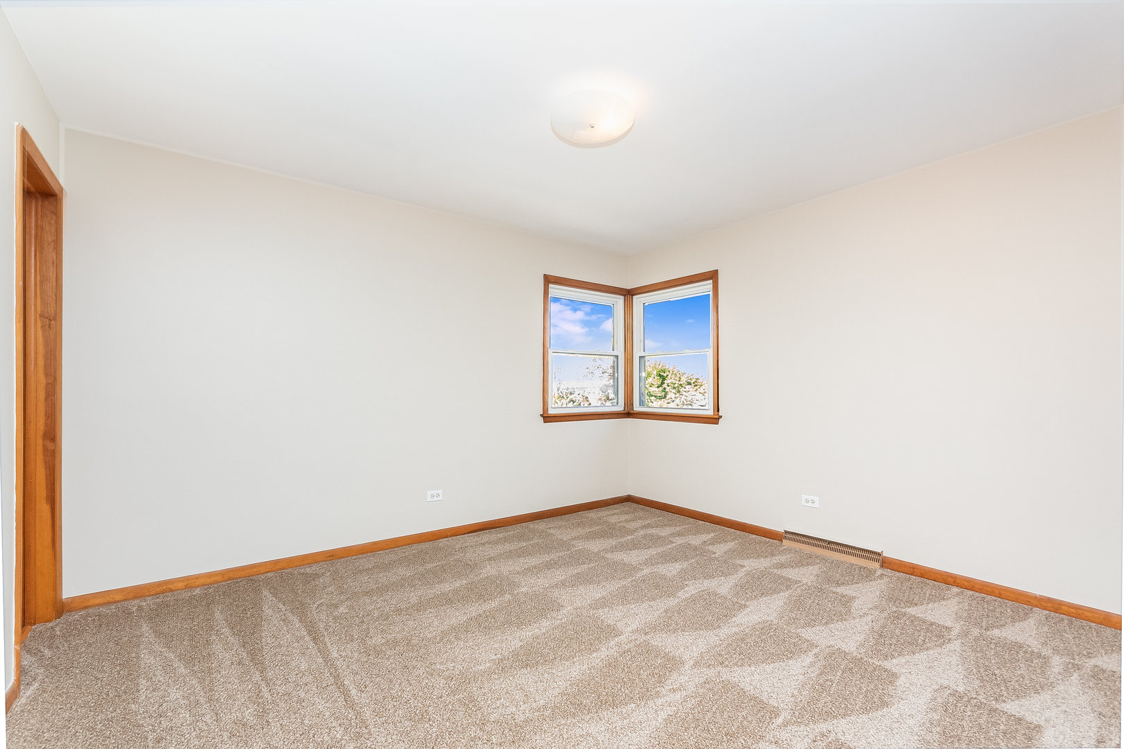 8 South Mt Prospect Road Mount Prospect, IL 60056 - Photo 11 of 25 an empty room with windows