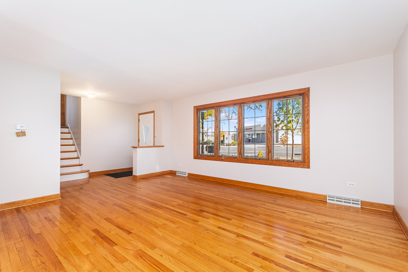 8 South Mt Prospect Road Mount Prospect, IL 60056 - Photo 4 of 25 a view of an empty room with window