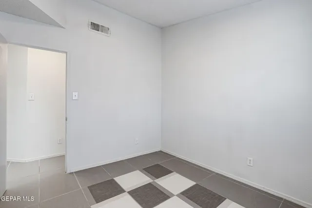 a view of a street with an ocean view