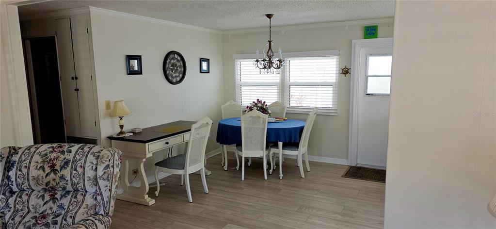 2331 Belleair Road, Unit 806 Clearwater, FL 33764 - Photo 6 of 23 a view of a dining room with furniture and window