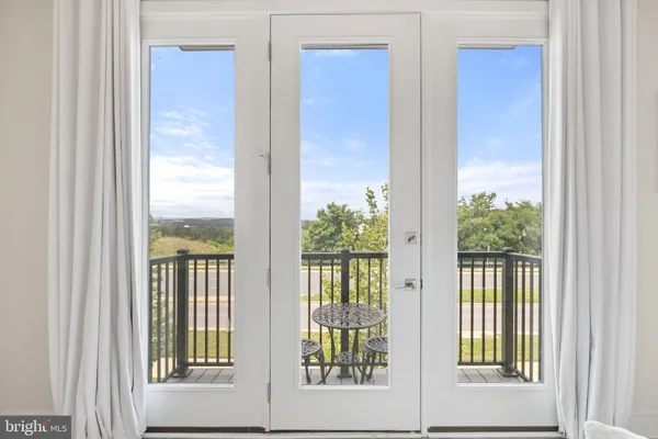 a view of a window with a swimming pool