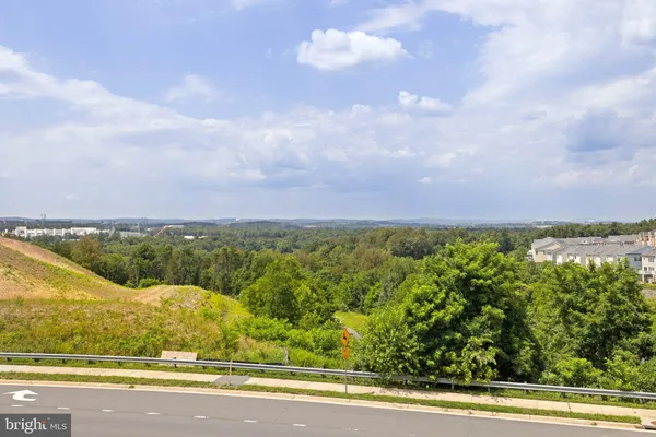 a view of storage and utility room with washer and dryer