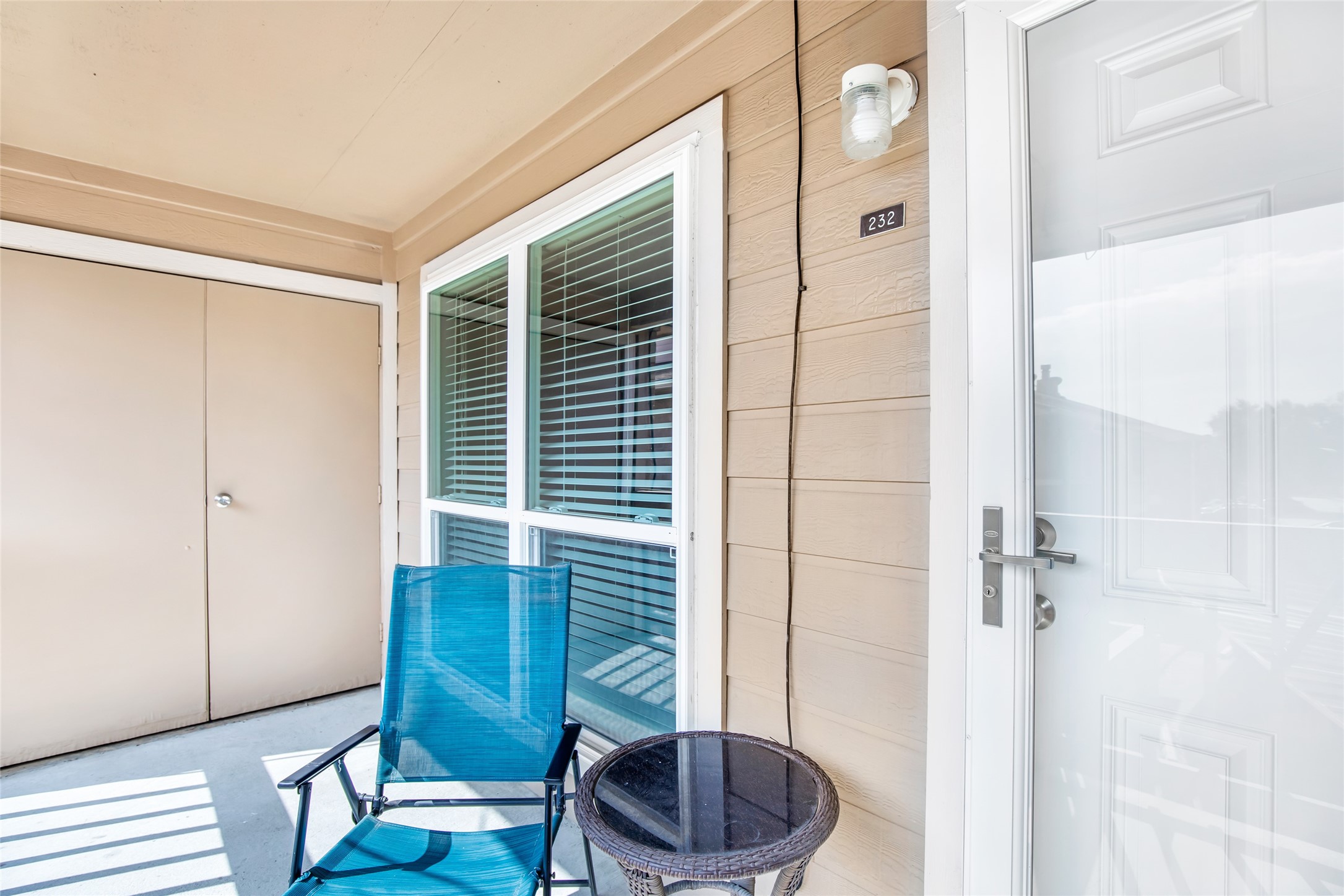 1505 Ward Road, Unit 232 Baytown, TX 77520 - Photo 15 of 20 Front porch with laundry area