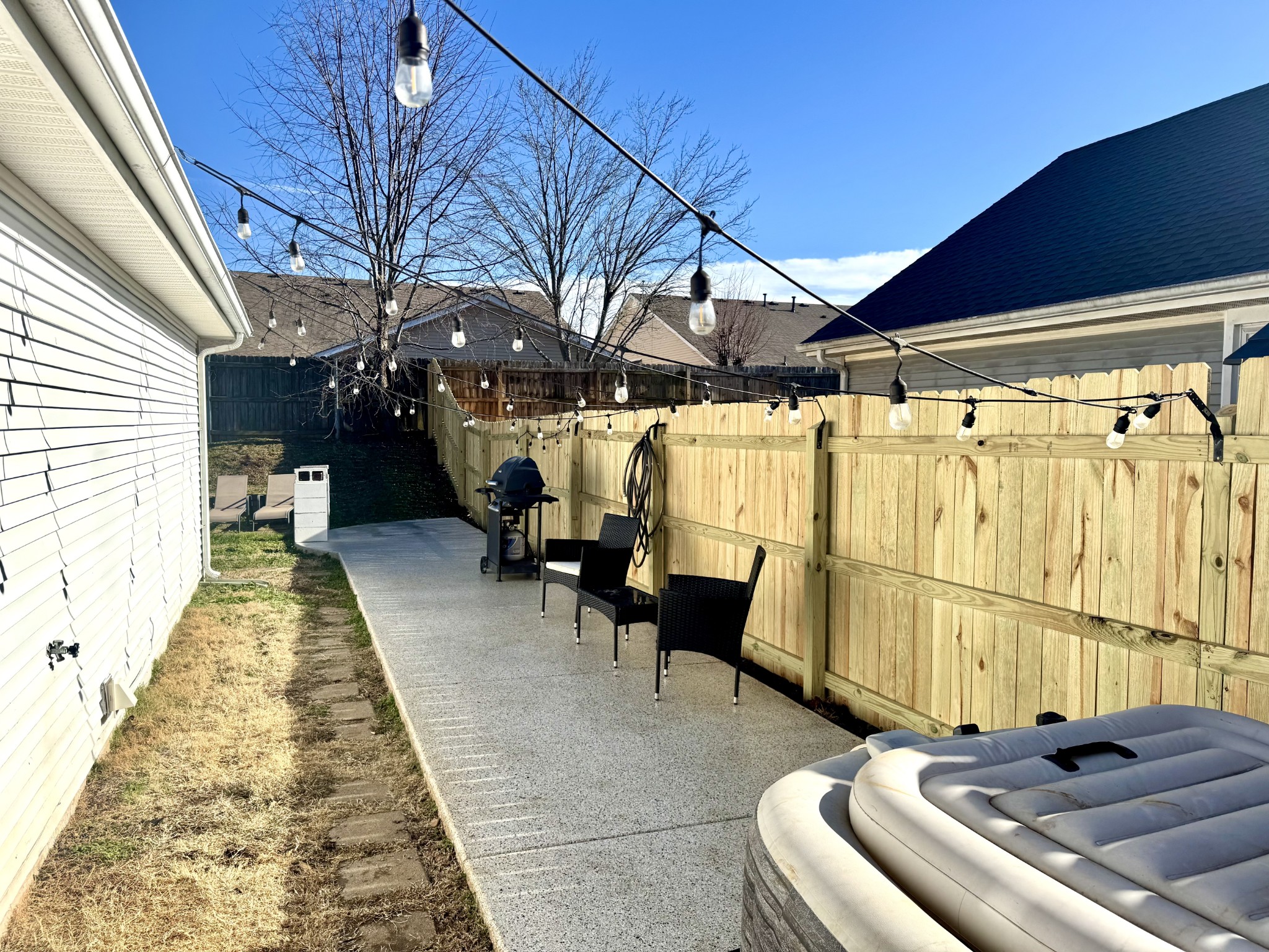 2747 Windwalker Court Murfreesboro, TN 37128 - Photo 13 of 15 a living room with furniture and a rug