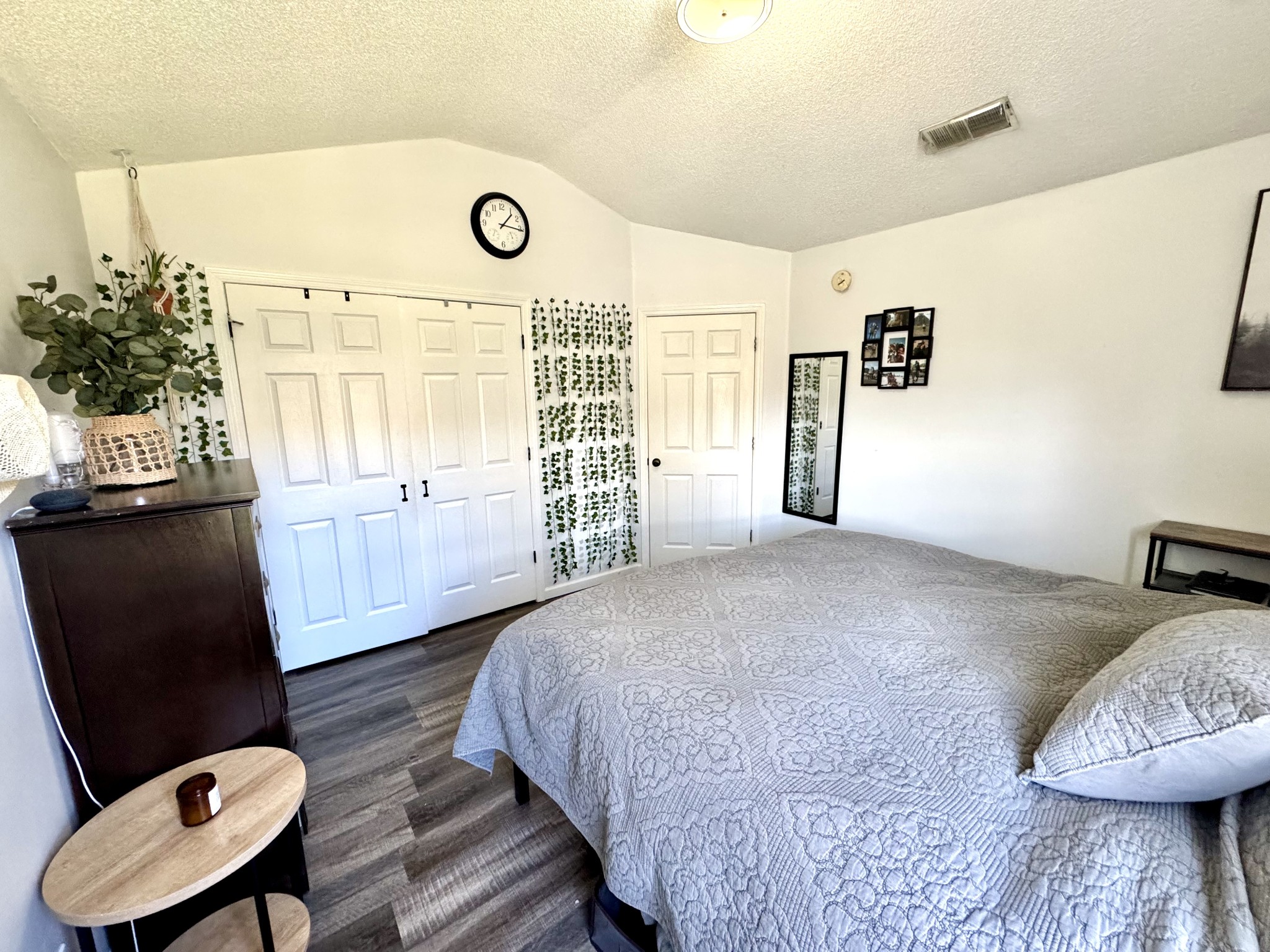 2747 Windwalker Court Murfreesboro, TN 37128 - Photo 7 of 15 a bedroom with a bed and a chair with the potted plant