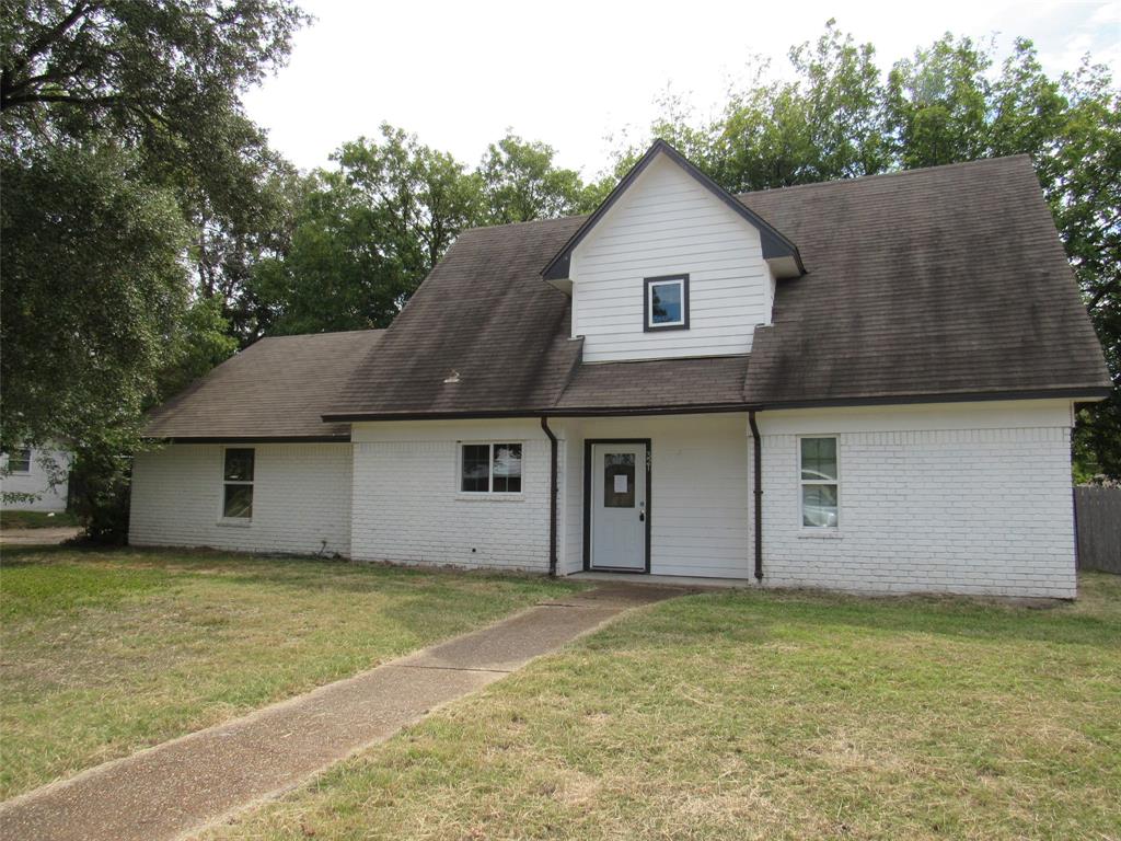 321 Crescent Drive Hewitt, TX 76643 - Photo 1 of 21 a front view of a house with a garden