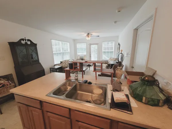 a room with furniture a rug and a window