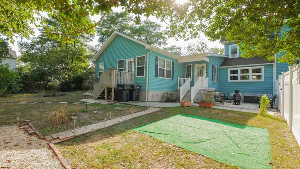 a backyard of a house with seating space