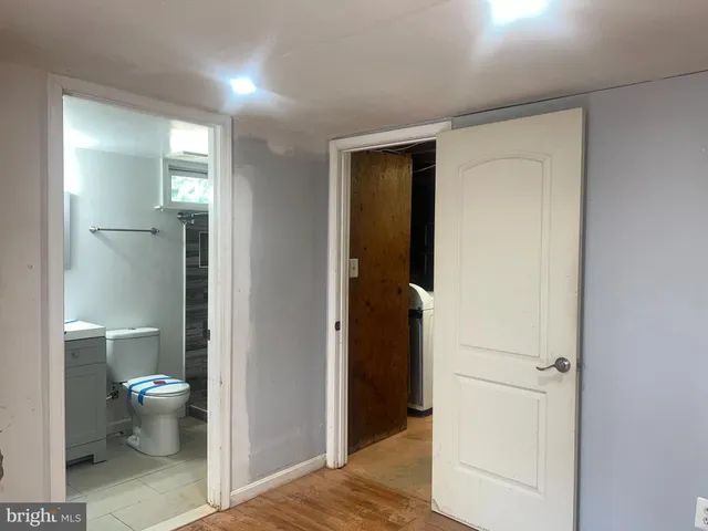 a view of a bathroom with toilet