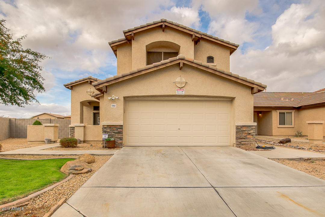5362 West Pecan Road Laveen, AZ 85339 - Photo 1 of 28 a view of a house with a yard