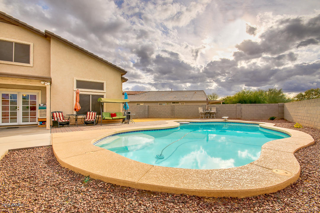 5362 West Pecan Road Laveen, AZ 85339 - Photo 27 of 28 a view of swimming pool with outdoor seating