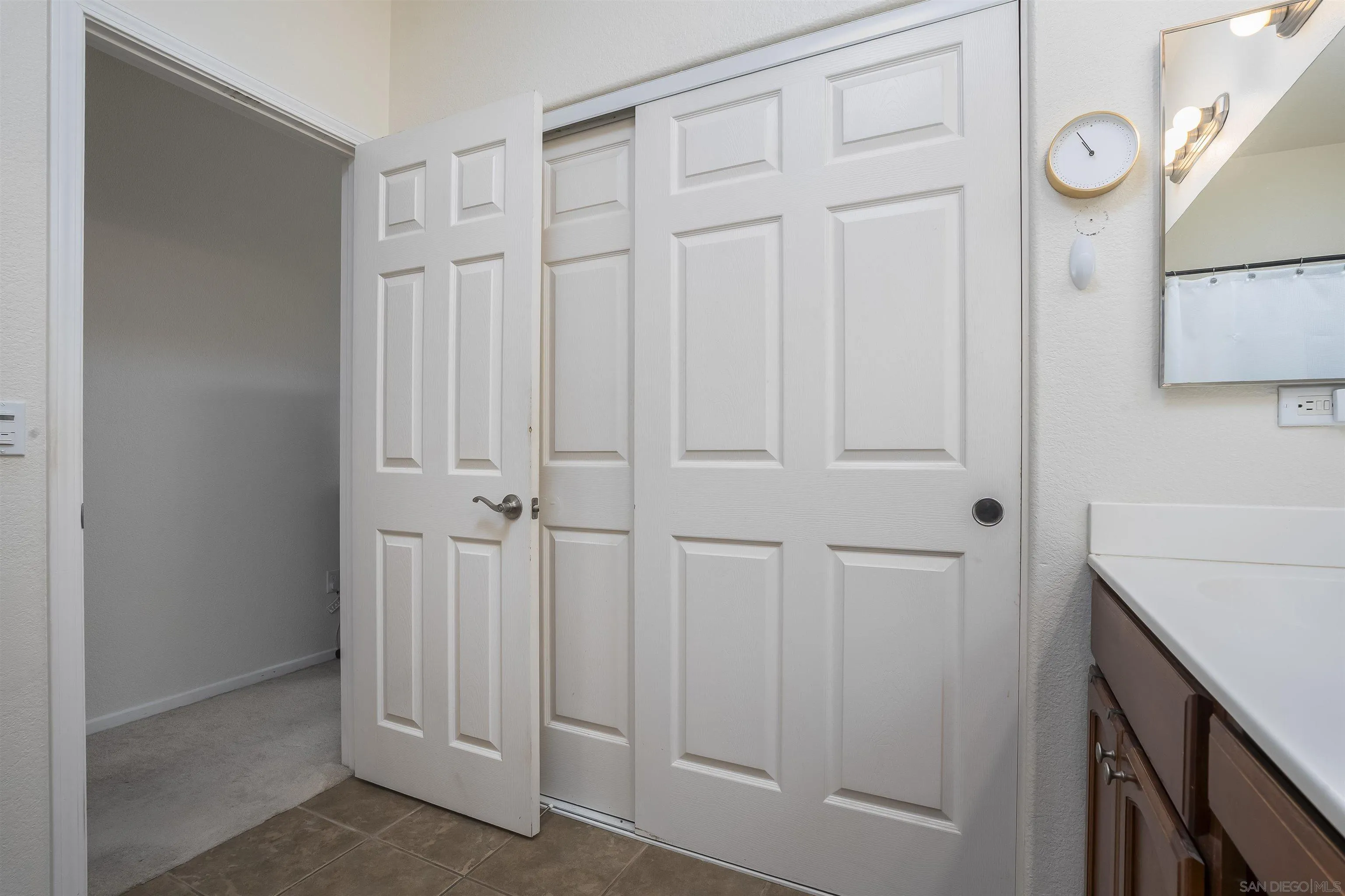 289 Reef Point Way, Unit 3 Oceanside, CA 92058 - Photo 13 of 23 a view of a closet area